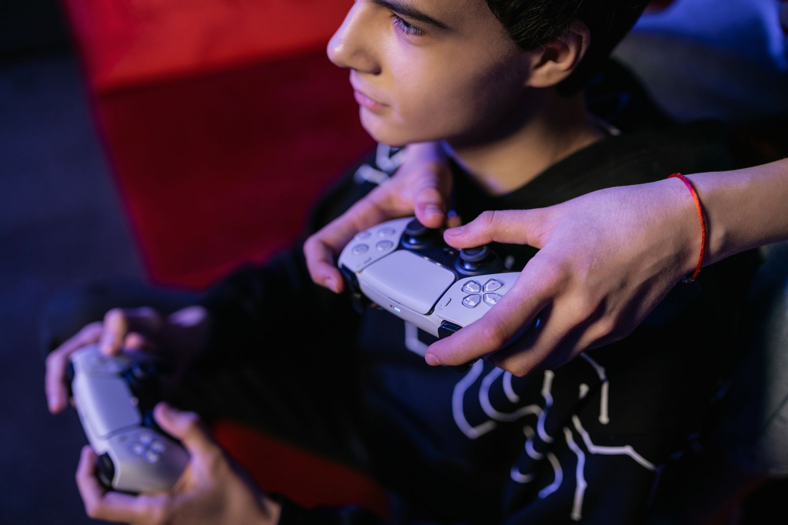 Friends playing a video game together, the fun-first test for any GameFi project