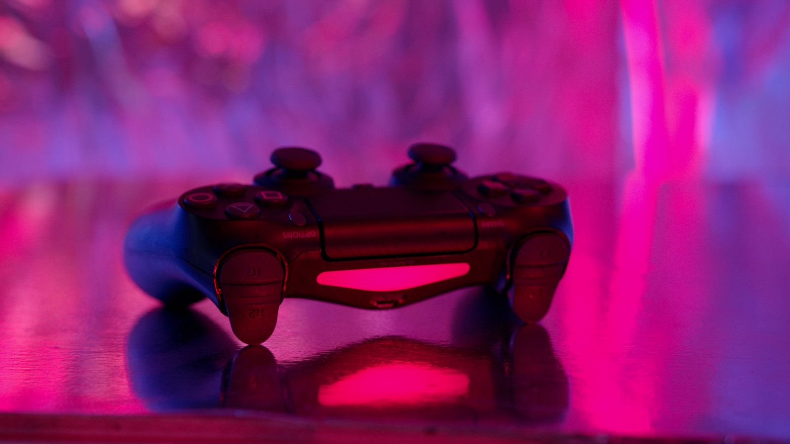 Game controller representing how web3 gaming links play to a crypto wallet