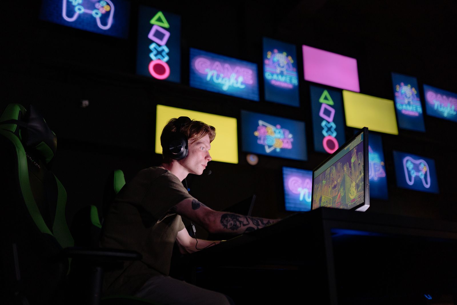 Gamer playing a web3 game on a PC in a neon-lit room